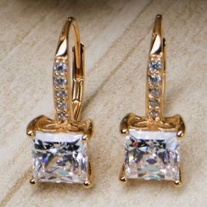 Touchstone Crystal by Swarovski LUMINOUS earrings in gold over sterling zirconia